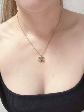 CHANEL Gold CC Pendant Necklace with Black Accents